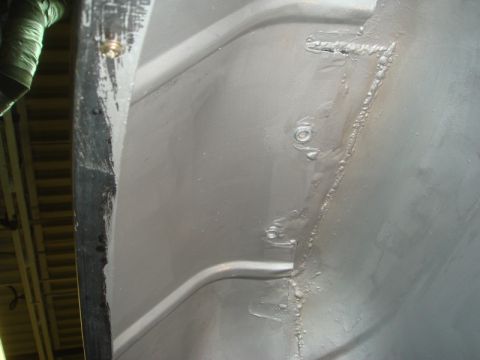1996 Ford Bronco - This is a close-up view of the inner fender well, showing welds and structural details.