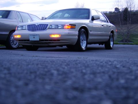 1996 Mercury Grand Marquis - Front view of a 1996 Mercury Grand Marquis parked outdoors.