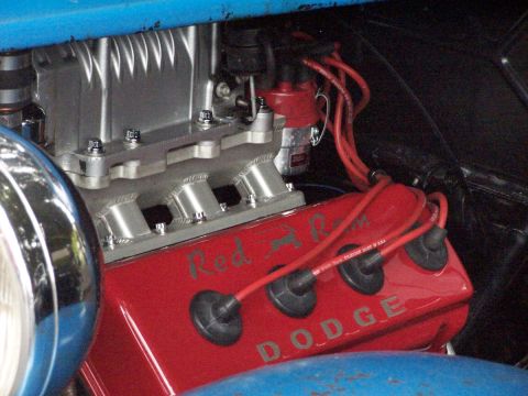 1990 Ford Bronco - The engine features a "Red Ram" inscription and "DODGE" branding on its red valve covers.