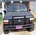 1989 Ford Bronco II - Front view of a black 1989 Ford Bronco II parked in a driveway.