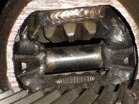 1989 Ford Bronco - Damaged differential gears show signs of welding and wear, indicating a significant mechanical issue.