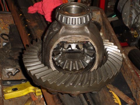 1989 Ford Bronco - Close-up of a vehicle differential and its ring gear assembly.