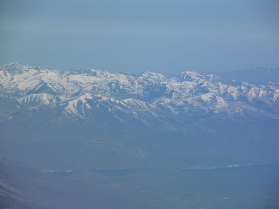 Snow-capped mountains under a clear blue sky