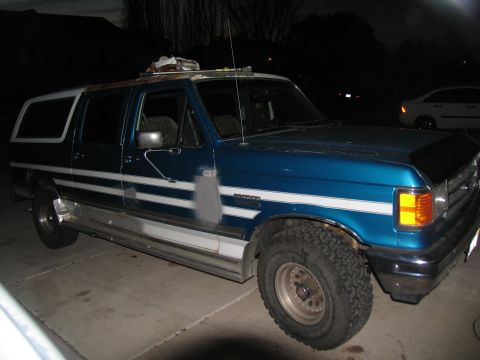 1995 Ford C-350 (Centurion Conversions) - This modified Ford Bronco SUV has a custom extended body and roof rack, with visible bodywork in progress.
