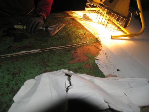 1995 Ford C-350 (Centurion Conversions) - Stripping old paint with a heat gun and scraper.
