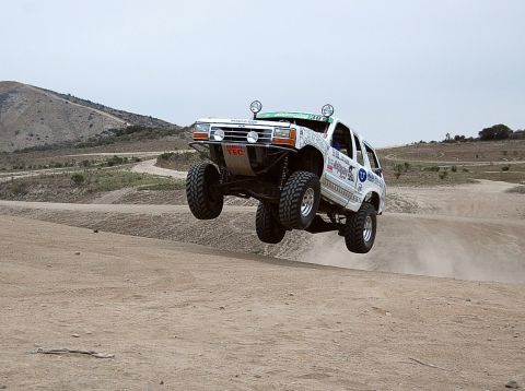 1992 Ford Explorer - This modified Ford Explorer is airborne during an off-road race.