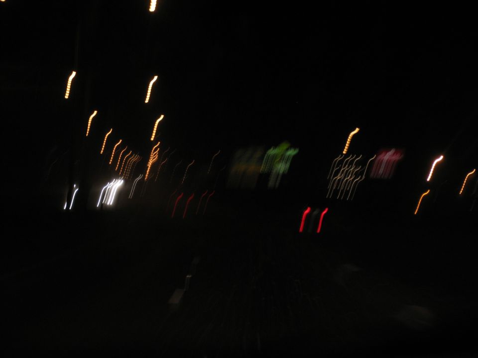 Streaks of light from vehicles at night, blurred motion