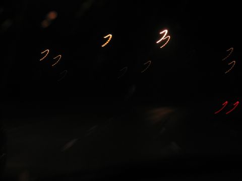 1995 Ford C-350 (Centurion Conversions) - Abstract light streaks are visible against a dark background.