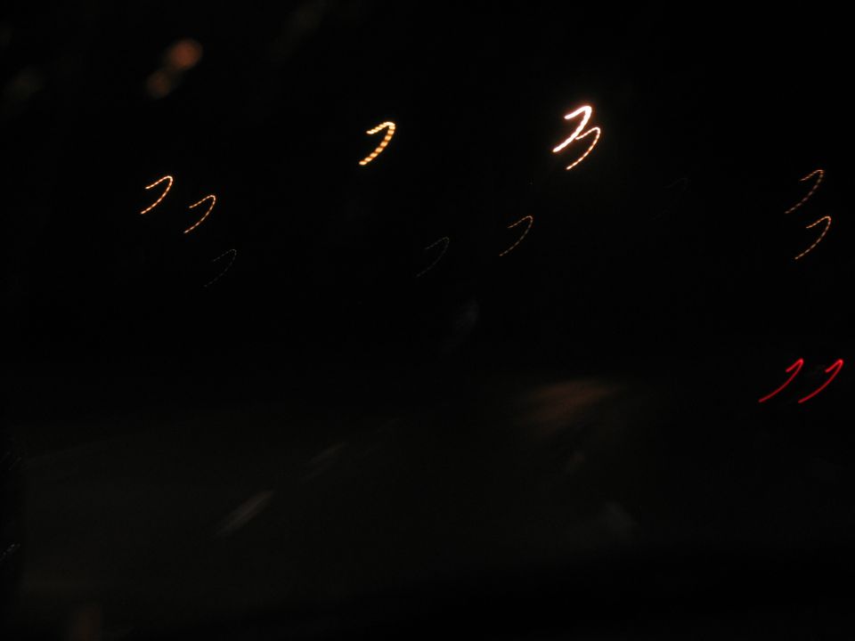 Abstract streaks of light against a black background