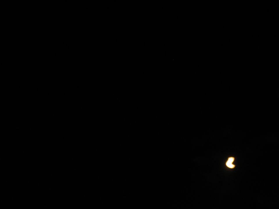 out-of-focus yellow lights on black background