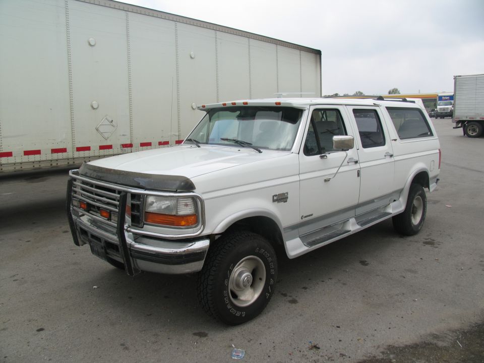 White 1995 Ford C-350 (Centurion Conversions) 3q-front view