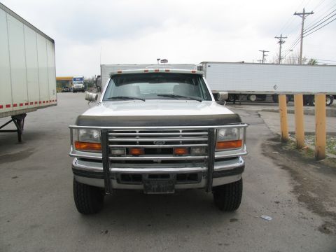 1995 Ford C-350 (Centurion Conversions) - Front view of a white Ford F-Series truck, likely from the early to mid-1990s.
