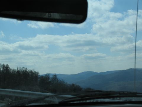 1995 Ford C-350 (Centurion Conversions) - Driving through mountains on a cloudy day, as seen from the driver's perspective.