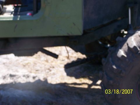 1989 Ford Bronco - Close-up of an off-road vehicle's chassis and tire, dated March 18, 2007.