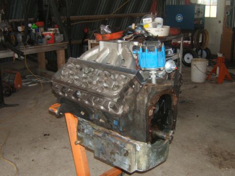 1980 Ford F-250 - V8 engine on an engine stand in a workshop setting.