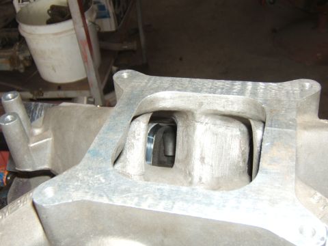 1980 Ford F-250 - This image shows a close-up view of an intake manifold, focusing on its internal ports and construction.