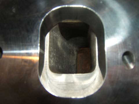 1980 Ford F-250 - This image shows a machined engine cylinder head intake port, not a 1980 Ford F-250.