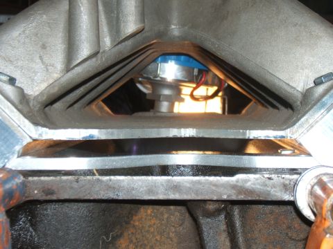 1980 Ford F-250 - Close-up view of an engine's distributor cap and rotor, showing internal components and wiring.