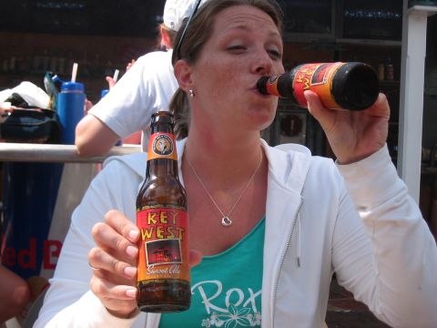 1991 Ford Bronco - A woman enjoys a Key West Sunset Ale beer on a sunny day.