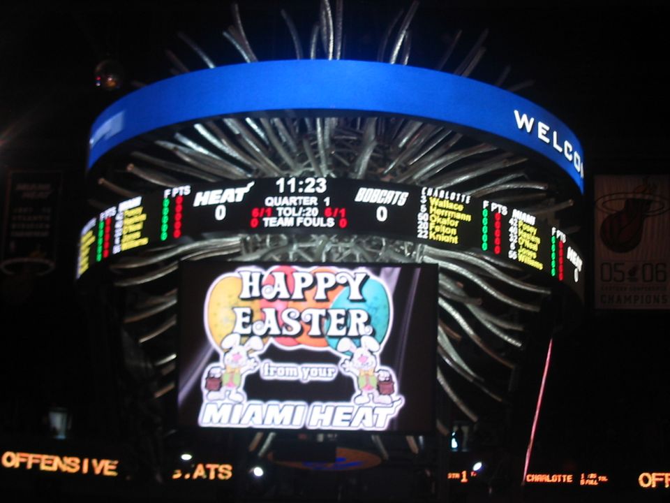 Miami Heat vs. Bobcats scoreboard showing game stats and a Happy Easter message with bunnies