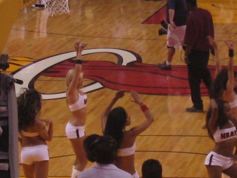1991 Ford Bronco - Cheerleaders perform on a basketball court with the Miami Heat logo visible.