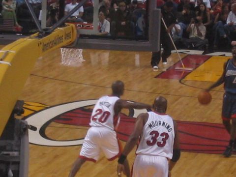 1991 Ford Bronco - Basketball players compete on the court at American Airlines Arena.