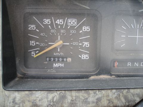 1986 Ford Bronco - The odometer reads 63,306 miles on this vehicle's dashboard.
