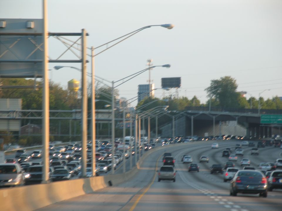 Highway traffic jam with many cars on multiple lanes