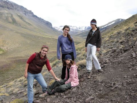 1986 Ford Bronco - A group of friends enjoys a day out in a , mountainous terrain.
