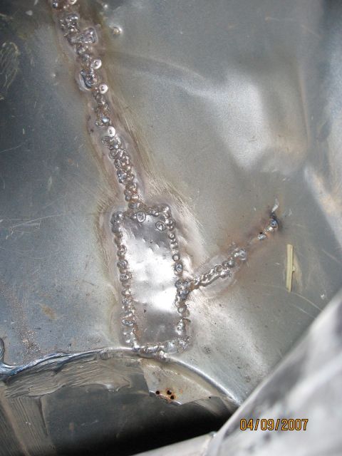 1994 Ford Bronco - Welding work on a metal panel, dated April 9, 2007.