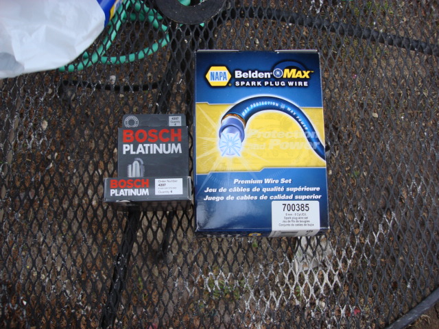 I was not sure when this was done last so i decided to replace the plugs and wires. I went to NAPA and got 8 new Bosh Platinum plugs and new Belden Max wires (700385).