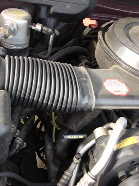 1983 Ford Bronco - here is the pass side as i started. it is hard to see with the air cleaner in place.