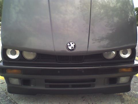 1989 BMW 3 Series - Front view of a 1989 BMW 3 Series showing its iconic grille and headlights.