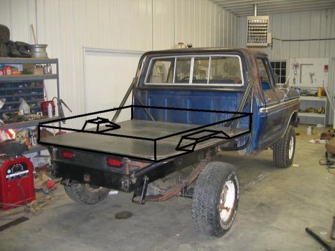 1974 Ford F-100 - Rear view of a blue pickup truck with a flatbed and custom roll cage, showing a black metal frame overlay.