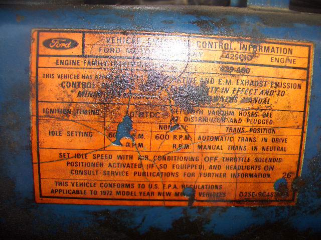 Weathered Ford vehicle emission control information decal for a 429 CID engine with idle settings
