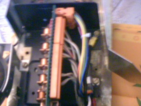 1991 Ford Crown Victoria - This image shows a close-up view of a vehicle's electrical wiring harness, multiple colored wires and copper connectors.