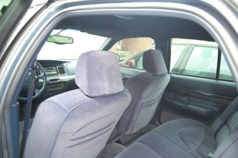 1985 Mercury Grand Marquis - Interior view of a 1995 Mercury Grand Marquis, showing the front seats and dashboard.
