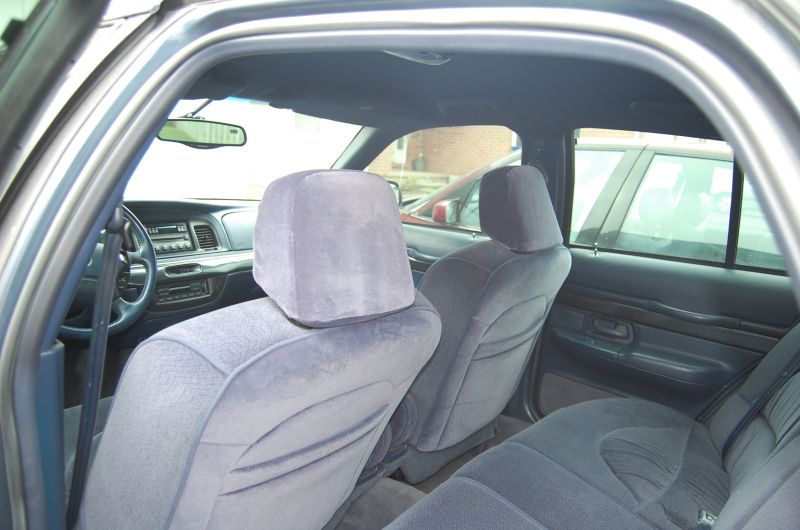 Interior view of a 1995 Mercury Grand Marquis showing front seats and dashboard