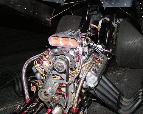1972 Ford Ranchero - Close-up of a powerful drag racing engine, a supercharger and exhaust headers.
