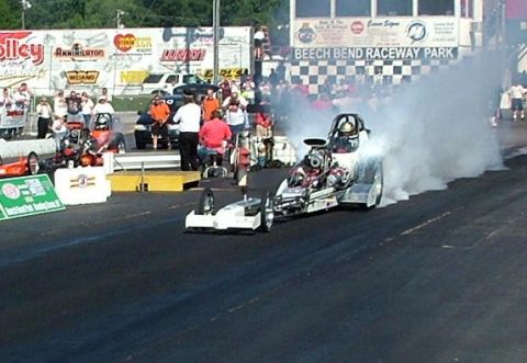 1972 Ford Ranchero - A dragster performs a burnout at Beech Bend Raceway Park, creating a large cloud of smoke.