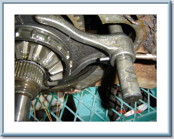 Differential gears and linkage assembly, metal, with visible oil and rust