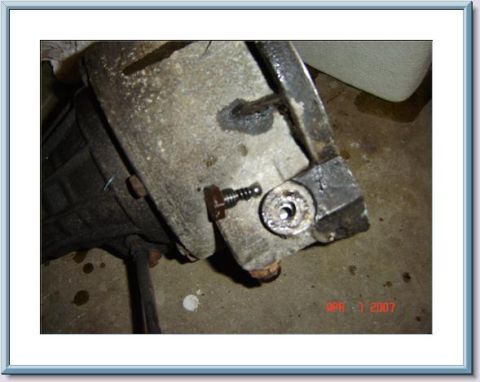 1978 Ford Bronco - Close-up view of an NP203 transfer case part, showing a bolt and mounting bracket. The image is dated April 1, 2007.