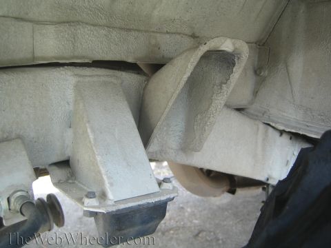 1987 Suzuki Samurai - Close-up view of the undercarriage, focusing on suspension and frame components.