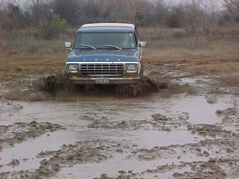 1978 Ford Bronco - This 1978 Ford Bronco is navigating through a challenging muddy terrain.