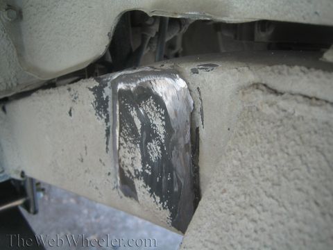 1987 Suzuki Samurai - Frame rail shows a welded patch, indicating a repair has been made.