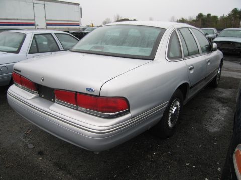 1991 Ford LTD Crown Victoria - This 1991 Ford Crown Victoria LTD is seen from the rear 3/4 angle in a parking lot.