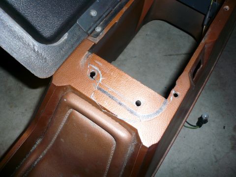 1975 Ford Ranchero - Interior console part showing modifications and mounting holes.