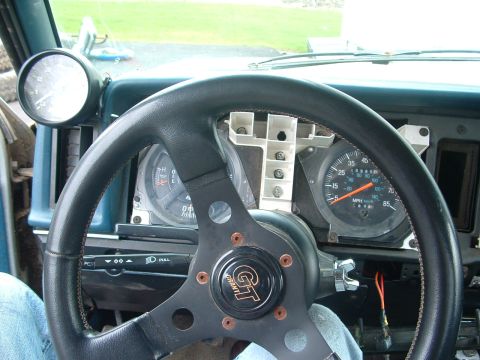 1983 Ford Ranger - Interior view of a 1983 Ford Ranger, a GT steering wheel and aftermarket gauges.