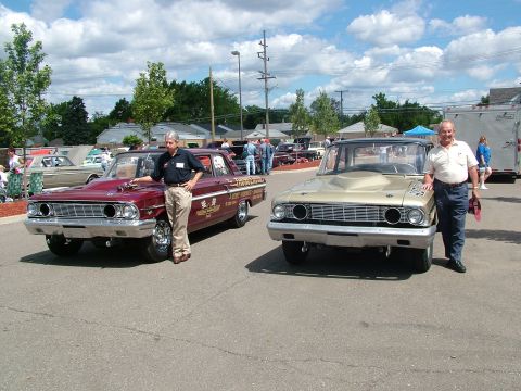 1972 Ford Ranchero - Two men stand with their classic drag racing cars at an outdoor event.