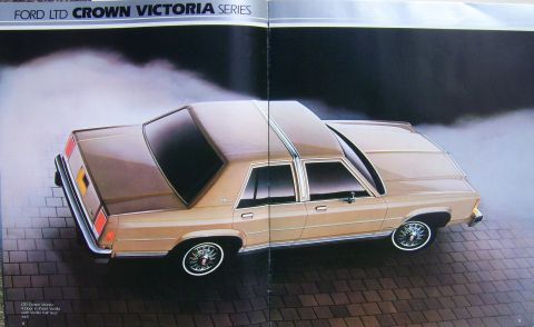 1982 Ford Crown Victoria LTD - This brochure image shows a 1982 Ford LTD Crown Victoria sedan with a two-tone paint scheme and chrome wheels.